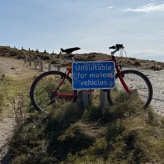 "Unsuitable for motor vehicles" sign on a bicycle 